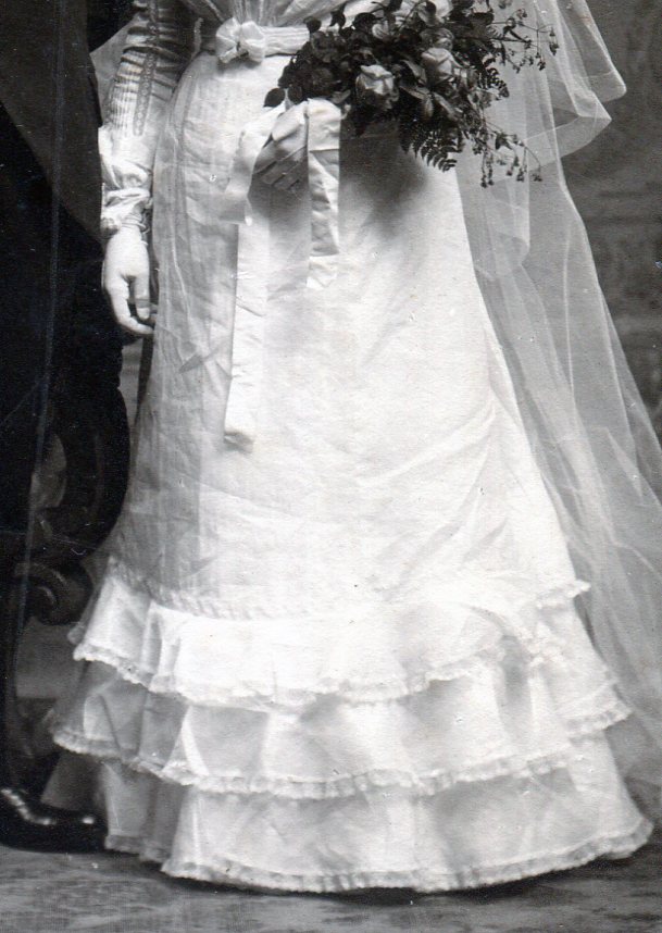 Bridal gown skirt with three rows of ruffles at the bottom