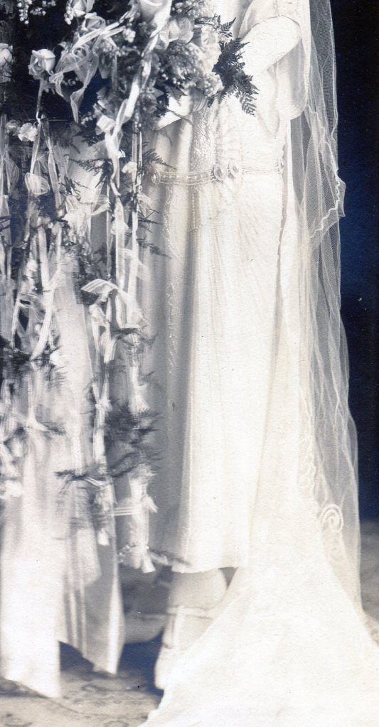Skirt of Bridal Gown showing detailed beading creating an Egyptian-style decoration